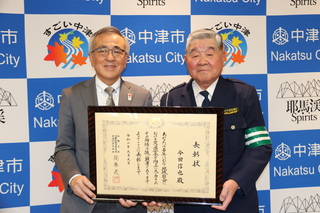 今田氏と奥塚市長（写真左）